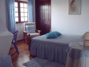 Cama o camas de una habitación en Villa Alves