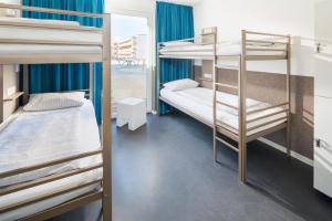 Postel nebo postele na pokoji v ubytování Jugendhaus Klipper Norderney