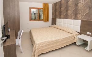 Posteľ alebo postele v izbe v ubytovaní Exclusive Suites Riva