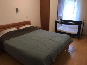 Postelja oz. postelje v sobi nastanitve Apartment Streliška