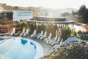 Bazén v ubytování Hotel Kowald Loipersdorf nebo v jeho okolí + 29 fotografií