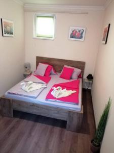 Posteľ alebo postele v izbe v ubytovaní My Home Apartman