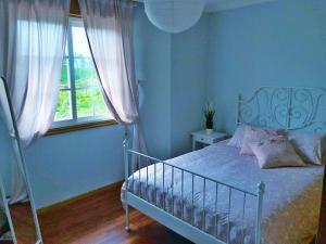 Llit o llits en una habitació de Villa Pazos