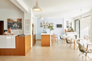 Η κουζίνα ή μικρή κουζίνα στο Sappho Hotel