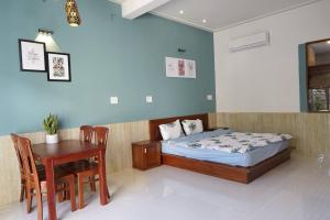 Kha Nguyen Apartment 2-Near Hoi An Old town客房内的一张或多张床位