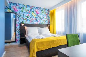 Een bed of bedden in een kamer bij Thon Hotel Moldefjord