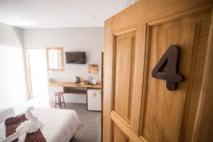Postel nebo postele na pokoji v ubytování @HOsTEL PHANGAN