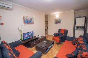 Khu vực ghế ngồi tại Apartment Nikolic Kotor
