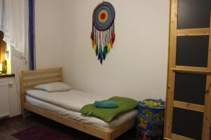 Posteľ alebo postele v izbe v ubytovaní Apartament Kolorowy pod Śnieżką