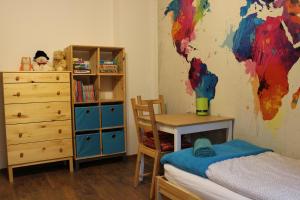 Posteľ alebo postele v izbe v ubytovaní Apartament Kolorowy pod Śnieżką