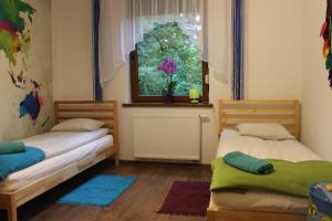 Posteľ alebo postele v izbe v ubytovaní Apartament Kolorowy pod Śnieżką