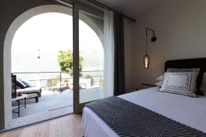 Posteľ alebo postele v izbe v ubytovaní Villa Mojana Bellagio