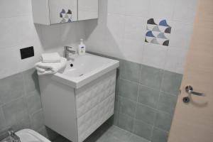 Koupelna v ubytování CASA SACA' + 29 fotografií