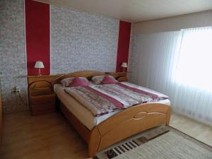 Postel nebo postele na pokoji v ubytování Haus Alexandra