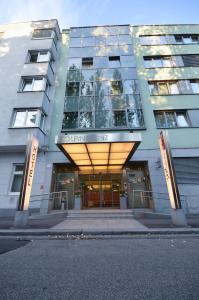 a large building with a large entrance to it at Kolpinghaus Linz in Linz