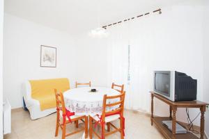 TV a/nebo společenská místnost v ubytování Apartments Delic