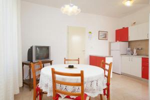 Kuchyň nebo kuchyňský kout v ubytování Apartments Delic