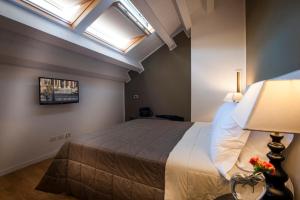 A bed or beds in a room at BB 22 Palace