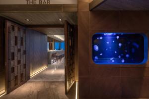a room with a bar on the wall at Amara - Sea Your Only View™ in Limassol