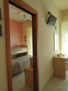 TV a/nebo společenská místnost v ubytování Hotel Solidea
