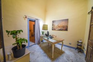 Televízia a/alebo spoločenská miestnosť v ubytovaní Il Sogno di Annalisa Suite