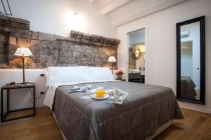 A bed or beds in a room at BB 22 Palace