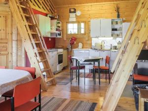 Kuchyň nebo kuchyňský kout v ubytování Holiday Home Muisku by Interhome