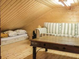 Postel nebo postele na pokoji v ubytování Holiday Home Muisku by Interhome