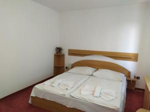 Postel nebo postele na pokoji v ubytování Hotel Isora