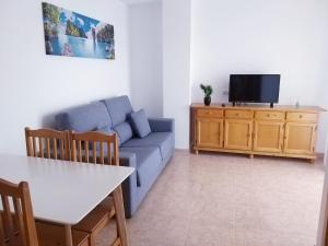 TV a/nebo společenská místnost v ubytování Acrópolis Vidaber