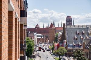 Výhľad na mesto Gdansk alebo výhľad na mesto priamo z apartmánu