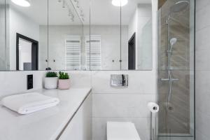 Kúpeľňa v ubytovaní Elite Apartments Old Town Rajska Residence