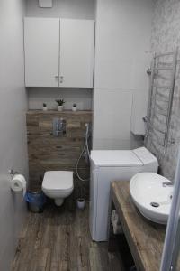 Ένα μπάνιο στο Apartment on Bratskaya 6
