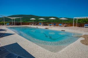 Bazén v ubytování Casa Vacanza Le Case nebo v jeho okolí