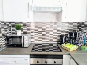 Kuchyň nebo kuchyňský kout v ubytování Islas Canarias Apartment