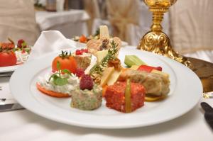 a white plate of food on a table at Heybeli Garden in Bursa