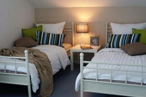 Postel nebo postele na pokoji v ubytování Ferienwohnung Ausblick