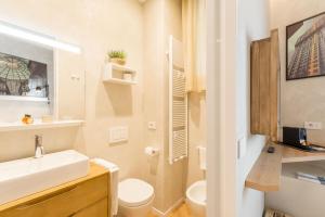 A bathroom at Duomo Deluxe Room
