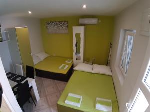 Posteľ alebo postele v izbe v ubytovaní Studio apartman F&L