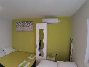 Posteľ alebo postele v izbe v ubytovaní Studio apartman F&L