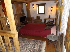 En eller flere senge i et værelse på Cottage in Dordogne