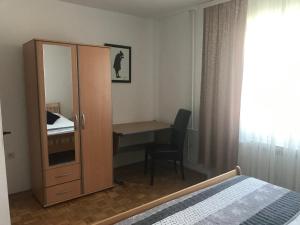 Un pat sau paturi într-o cameră la Sarajevo Radnička
