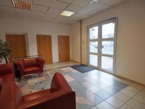 Posedenie v ubytovaní 3-Bedroom apartment in Rajhrad, with kitchen, 2 bathrooms, parking