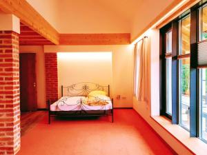 Ein Bett oder Betten in einem Zimmer der Unterkunft Sunhill Appartments