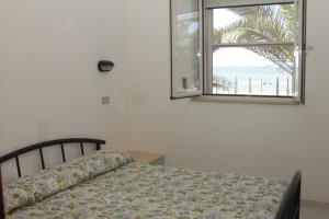 Voodi või voodid majutusasutuse Albergo 2 Pini toas