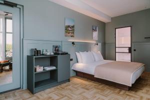 Letto o letti in una camera di Supernova Hotel