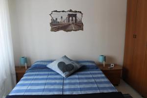Posteľ alebo postele v izbe v ubytovaní casa vacanza Due Elle - Casa Alice