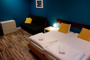 Posteľ alebo postele v izbe v ubytovaní Hello Hostel & Apartments
