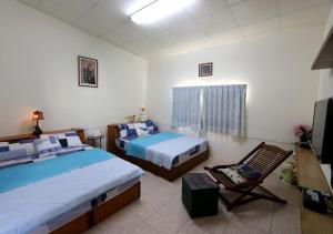 Letto o letti in una camera di Gods Home