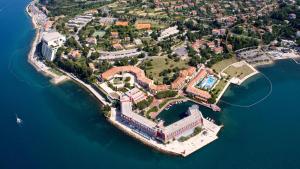 an aerial view of an island in the water at Solmar, Apartment with big terrace near nature in Portorož